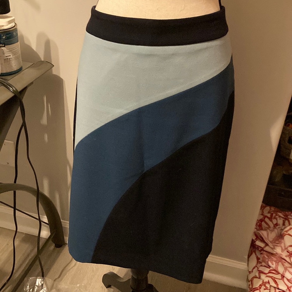 Wine a A-line skirt slightly used. Like new!